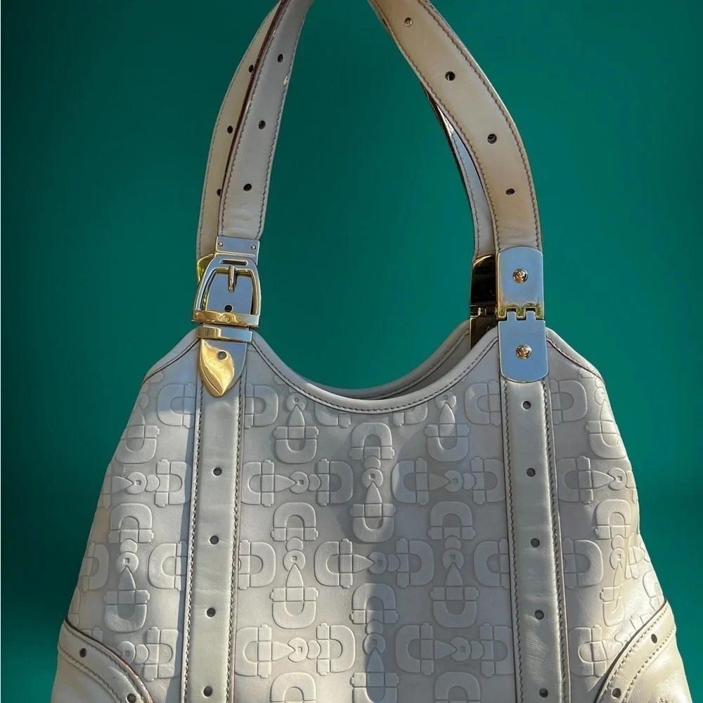 Gorgeous embossed horse it Gucci